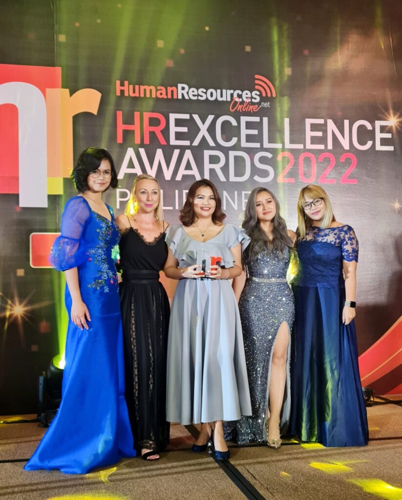 five women posing together at HR awards event